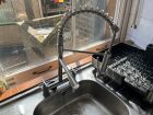 New kitchen taps with washer hose.