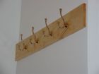 Coat hooks in gallery bedroom