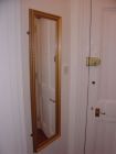 Tall mirror in hall