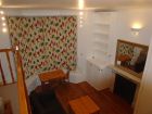 Reception room with closed curtains